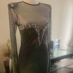 Beautiful sequence mid length dress with rhinestones.